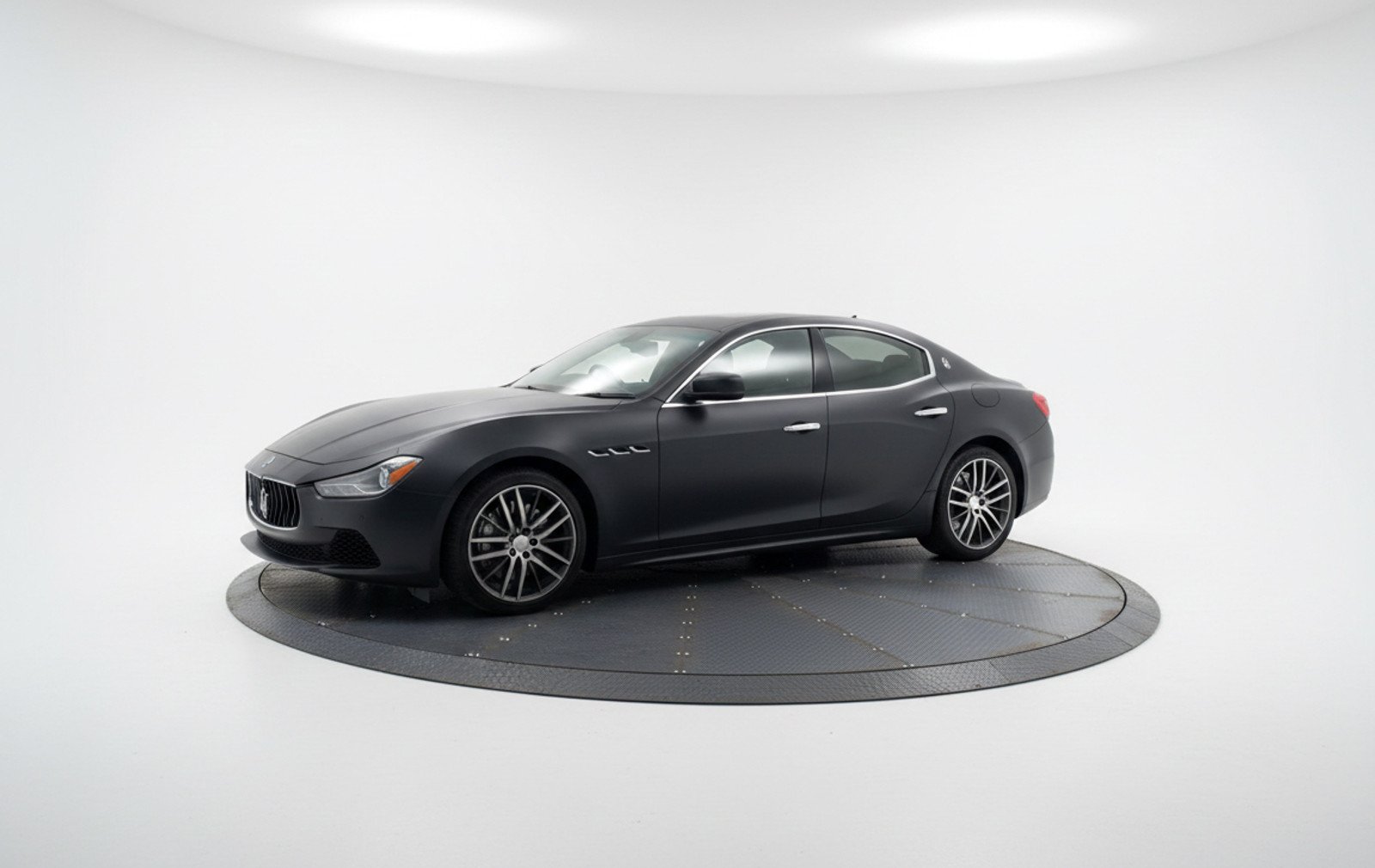 TurnTech turntable installed on a sloped driveway