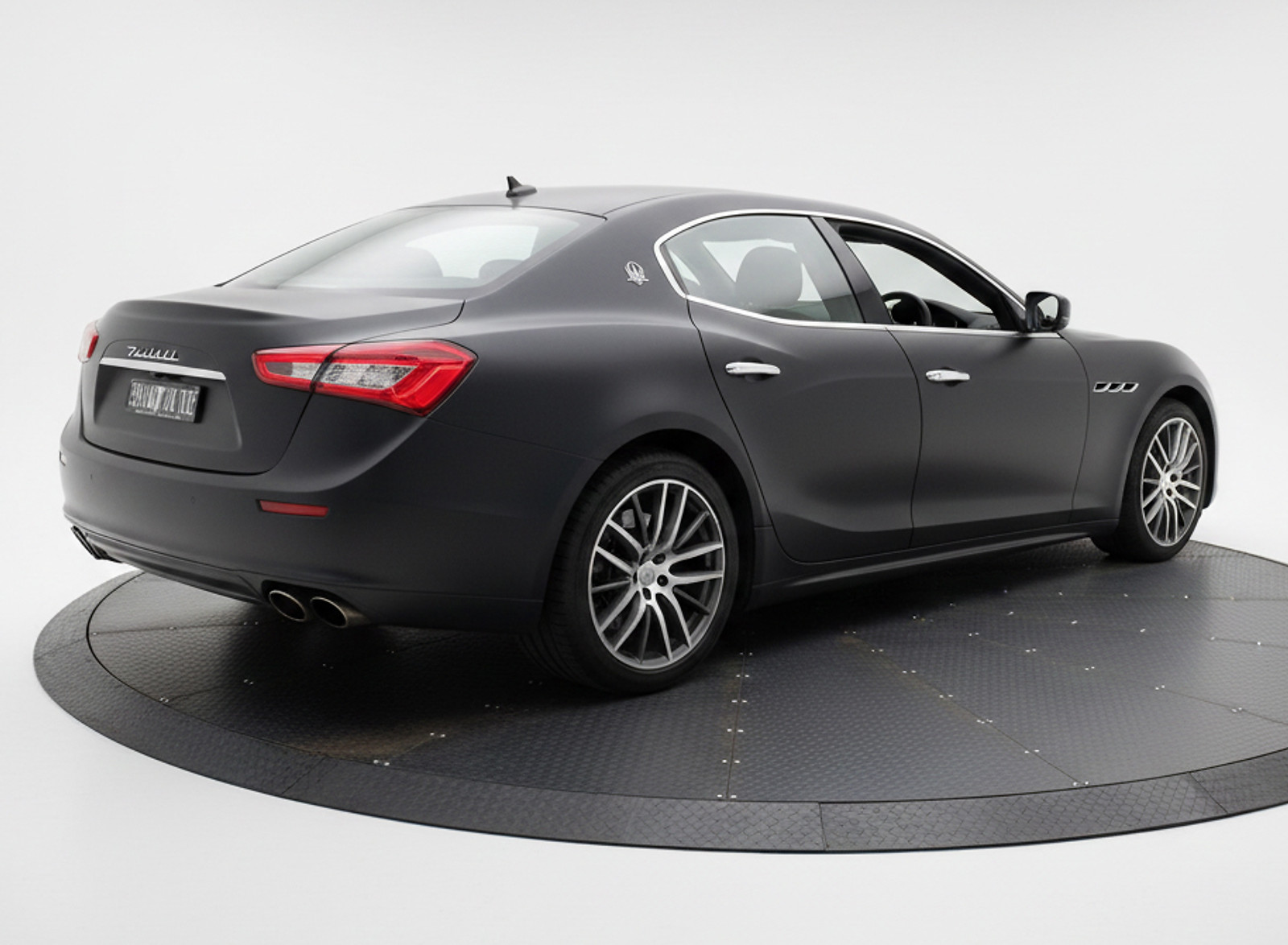 TurnTech turntable in use on a residential driveway